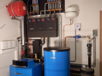 CV- installatie + hemelwaterrecuperatiesysteem in wasplaats