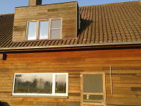 houtskelet uitbouw ipv dakkapel, houten achtermuur